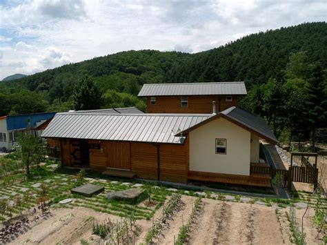 台灣四合院出售|四合院結構的鄉間住宅: 混搭混凝土與木頭的質樸好空間 